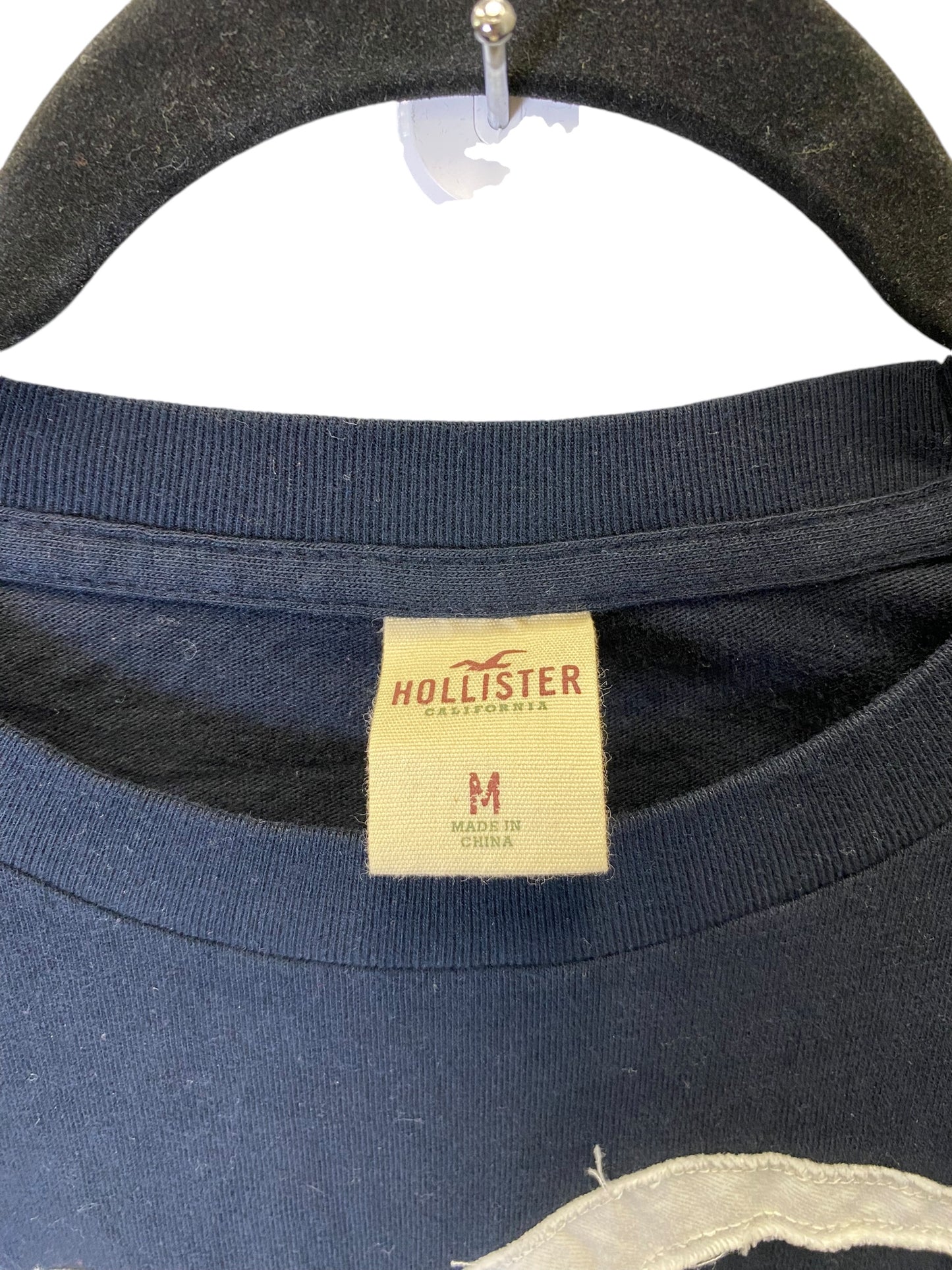 Top Long Sleeve By Hollister In Navy, Size: M